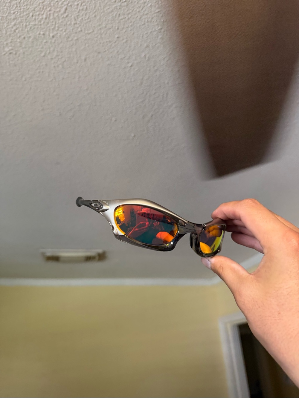 Sporty Mirrored Sunglasses in Silver with Orange-Red Lenses Oakley